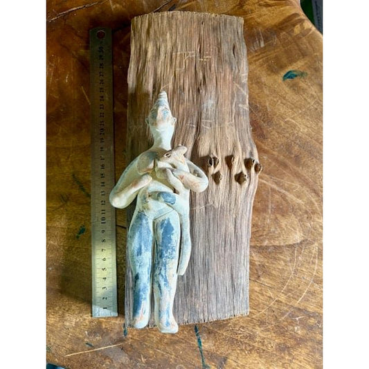 goddess mounted on wood